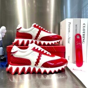 - Christian Louboutin
Loubishark Leather Low-Top Sneakers